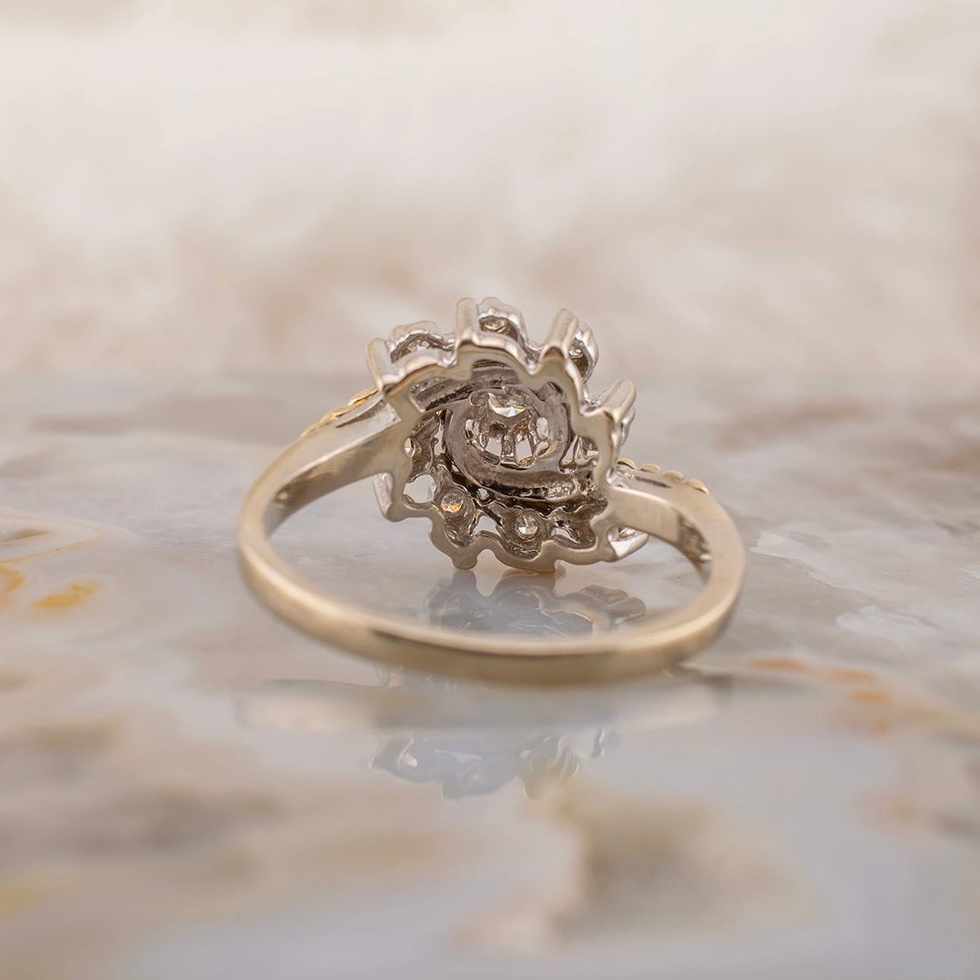 Vintage 14 Karat Two Tone White and Yellow Gold 0.12 Carat Diamond Swirl Design Ring With Rope Detail Size 5.75 Circa 1980s