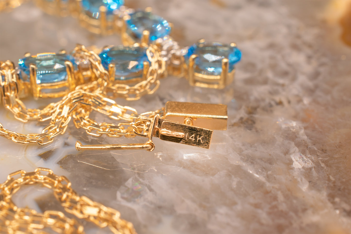 Vintage 14k Yellow Gold Oval Shape Swiss Blue Topaz and Diamond "V" Design Necklace 15 1/2 Inches