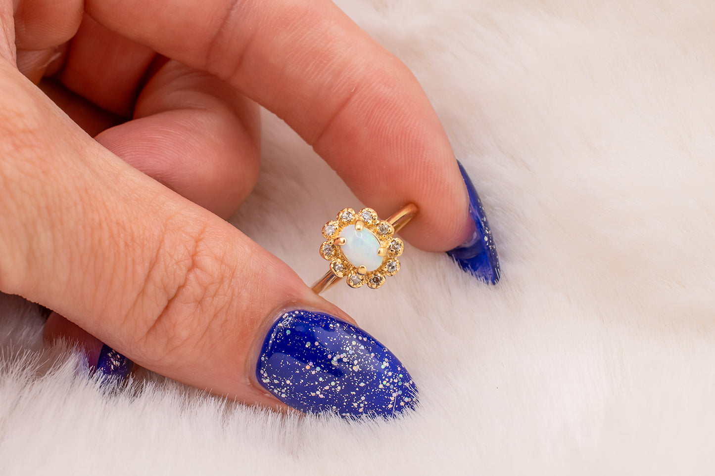 Circa 1940s Retro Era Vintage 14 Karat Yellow Gold 0.05 Carat Diamond Halo and 0.28 Carat Oval Cabochon Small Ring, Pinky Ring