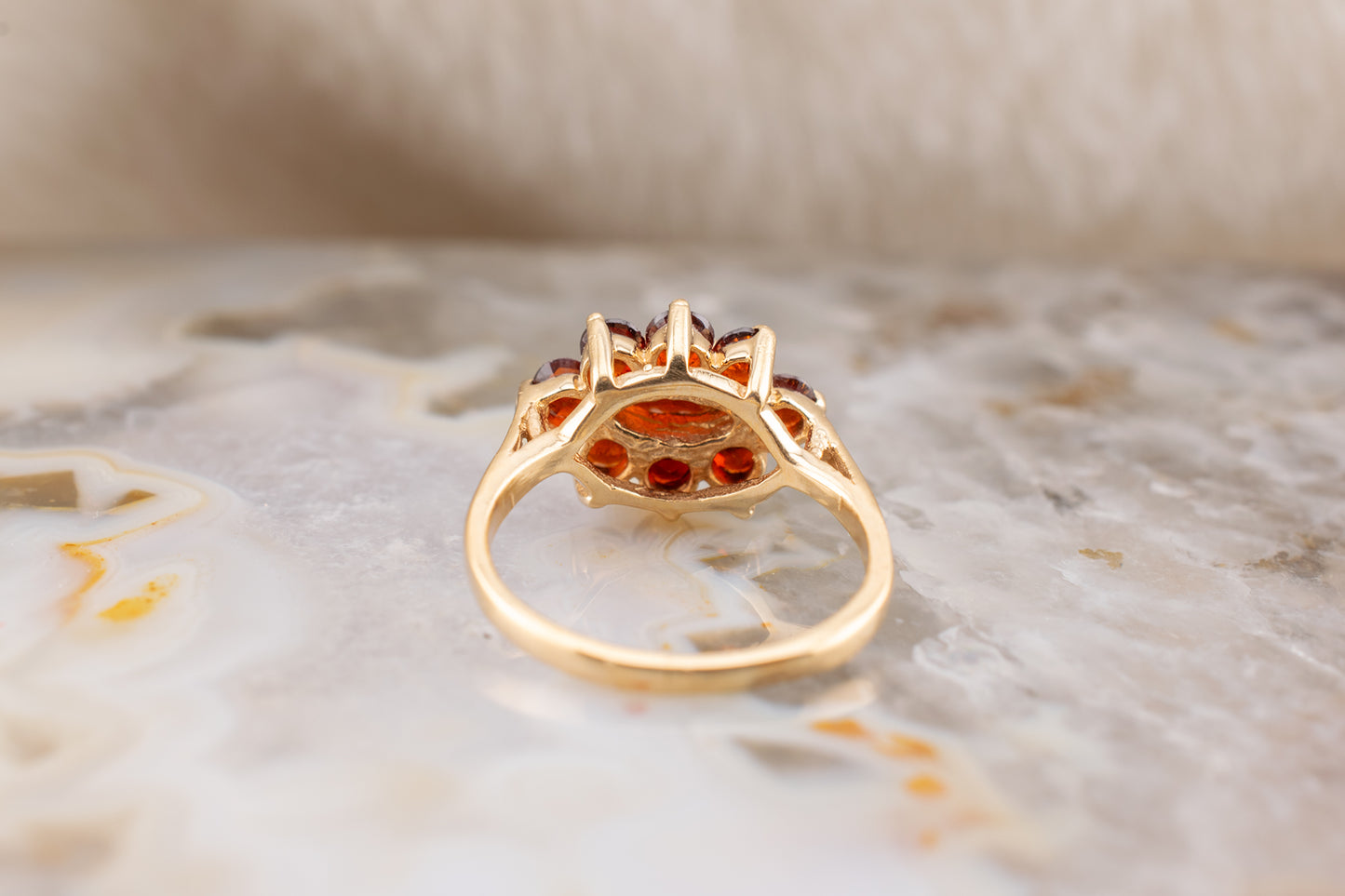 Circa 1990s Vintage 10 Karat Yellow Gold Marquise and Round Shape 1.21 Carat Garnet Small Ring Size 3.75