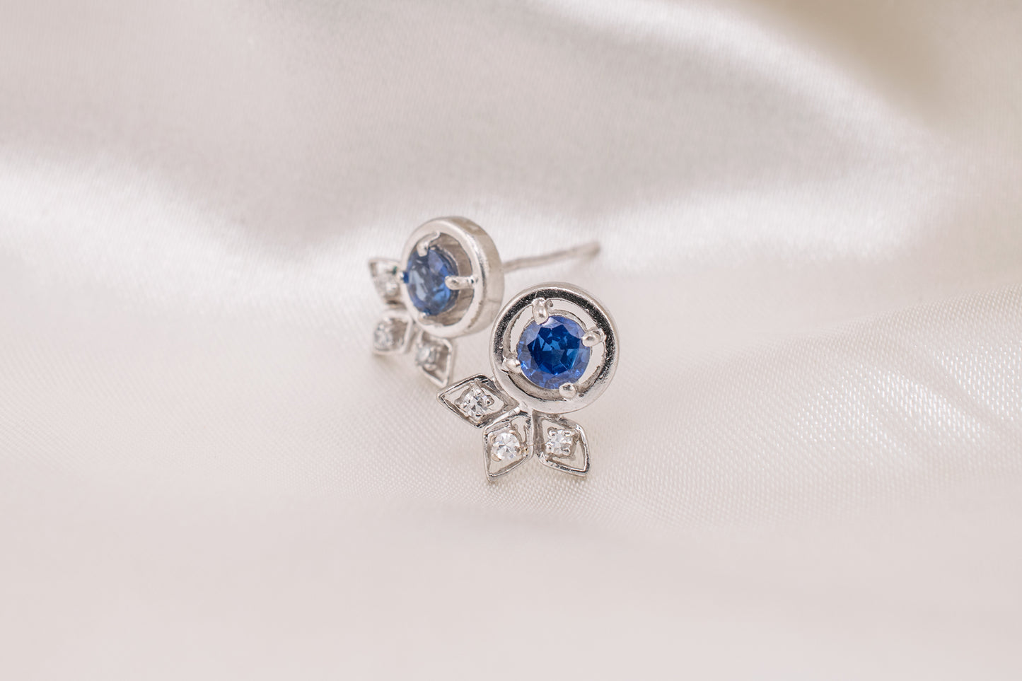 Minimalist Circa 2000s Vintage Estate 14 Karat White Gold 0.50 Carat Round Blue Sapphire and 0.06 Carat Diamond Push Back Stud Earrings