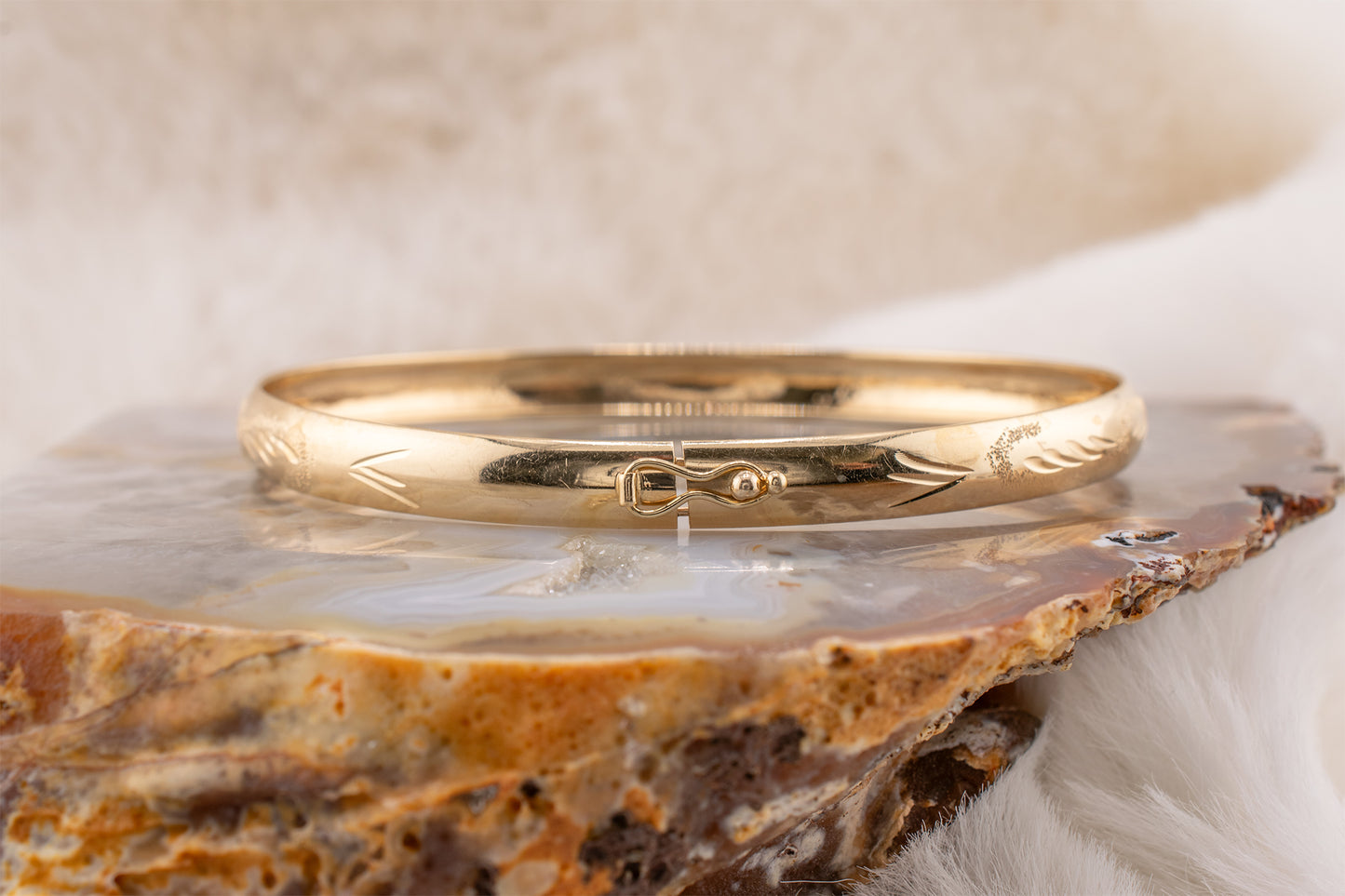 Circa 2000-2005 Vintage 10 Karat Yellow Gold Palm Leaf Design and Diamond Cut Detail Bangle Bracelet Approx. 7.75 Inches 6.2mm Wide