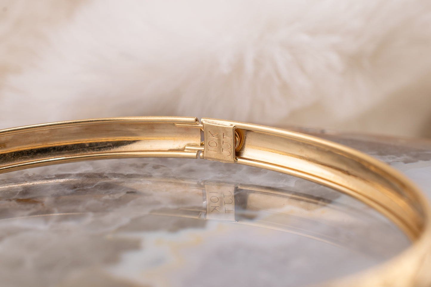 Circa 2000-2005 Vintage 10 Karat Yellow Gold Palm Leaf Design and Diamond Cut Detail Bangle Bracelet Approx. 7.75 Inches 6.2mm Wide