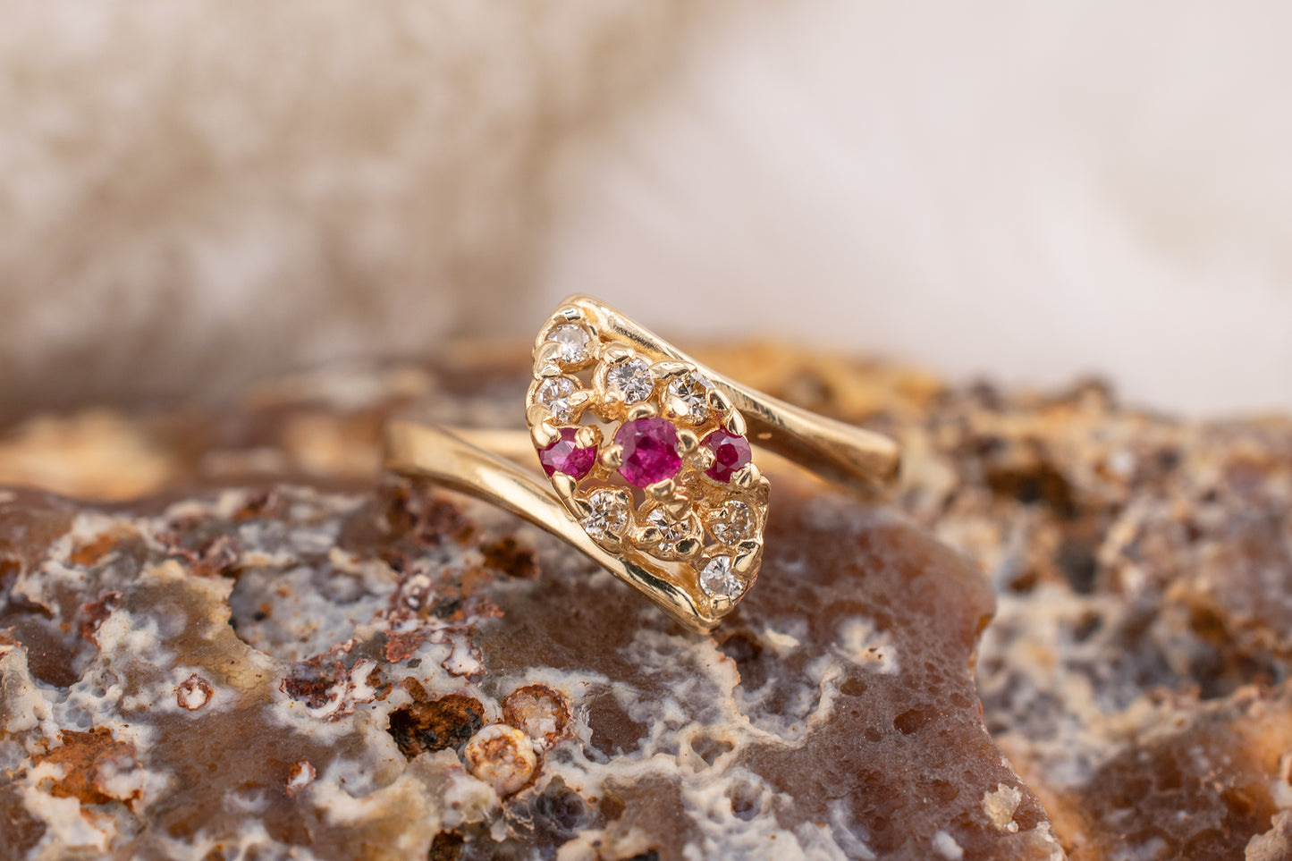 Circa 1980s Vintage 14 Karat Yellow Gold 0.08 Carat Diamond and 0.10 Carat Natural Ruby Navette Shaped Design Ring Size 4 3/4