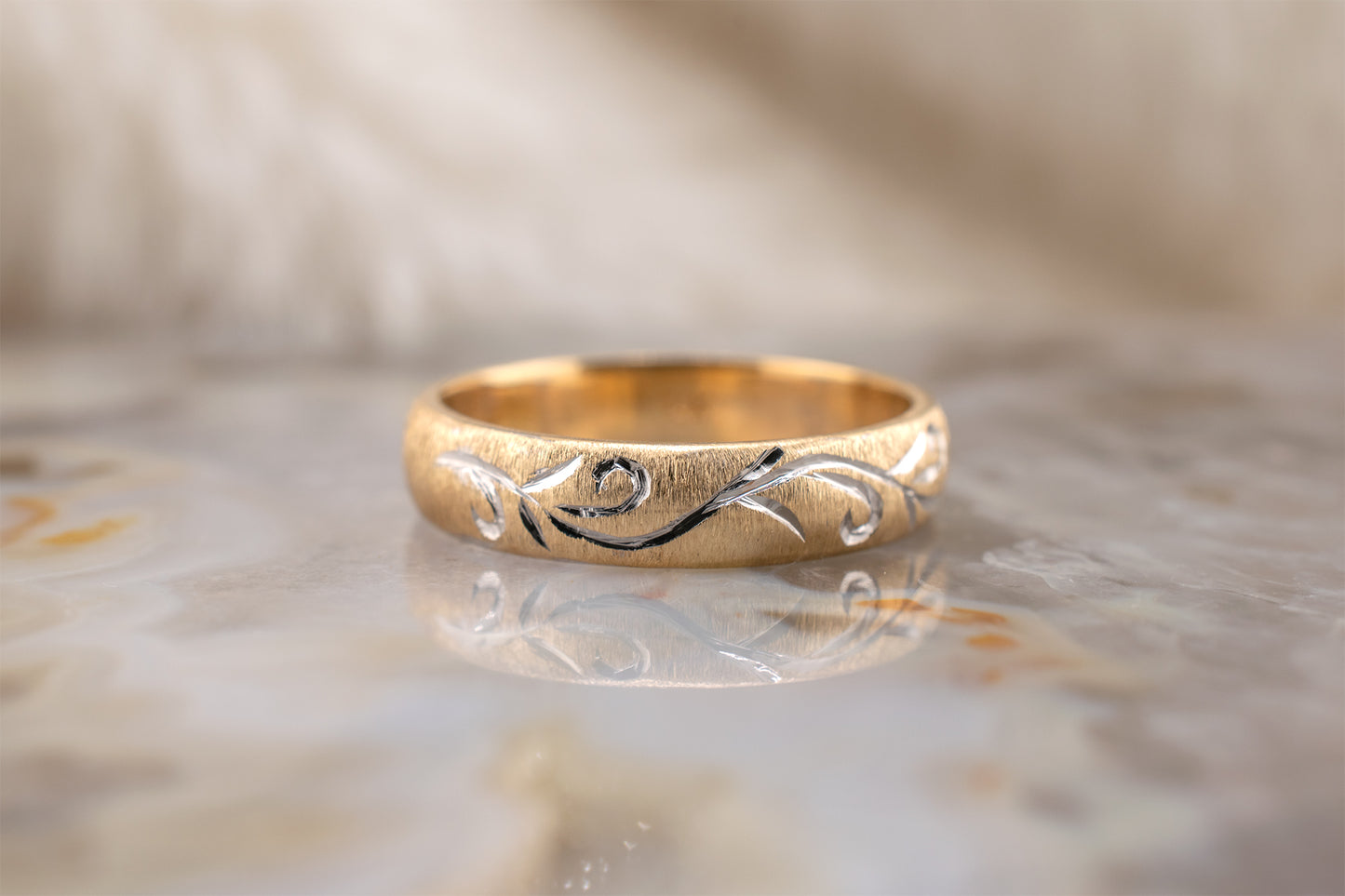 Circa 1990s Minimalist Vintage Two Tone Yellow Gold Satin Brushed Finish Band with White Gold Hand Carved Scroll Design Size 5.75 4.1mm