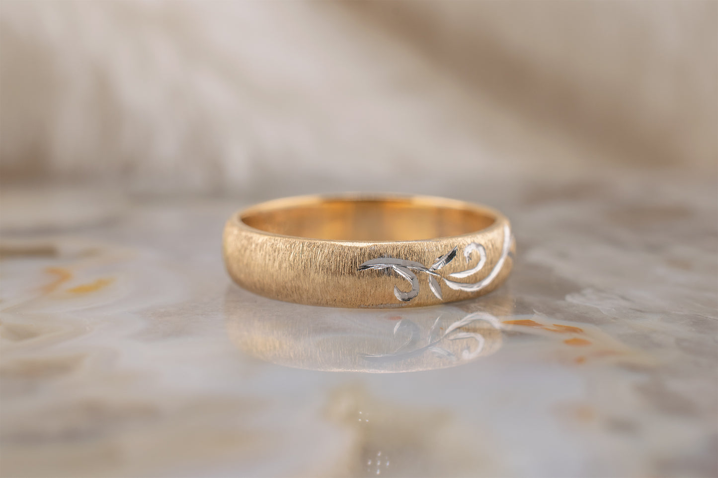 Circa 1990s Minimalist Vintage Two Tone Yellow Gold Satin Brushed Finish Band with White Gold Hand Carved Scroll Design Size 5.75 4.1mm