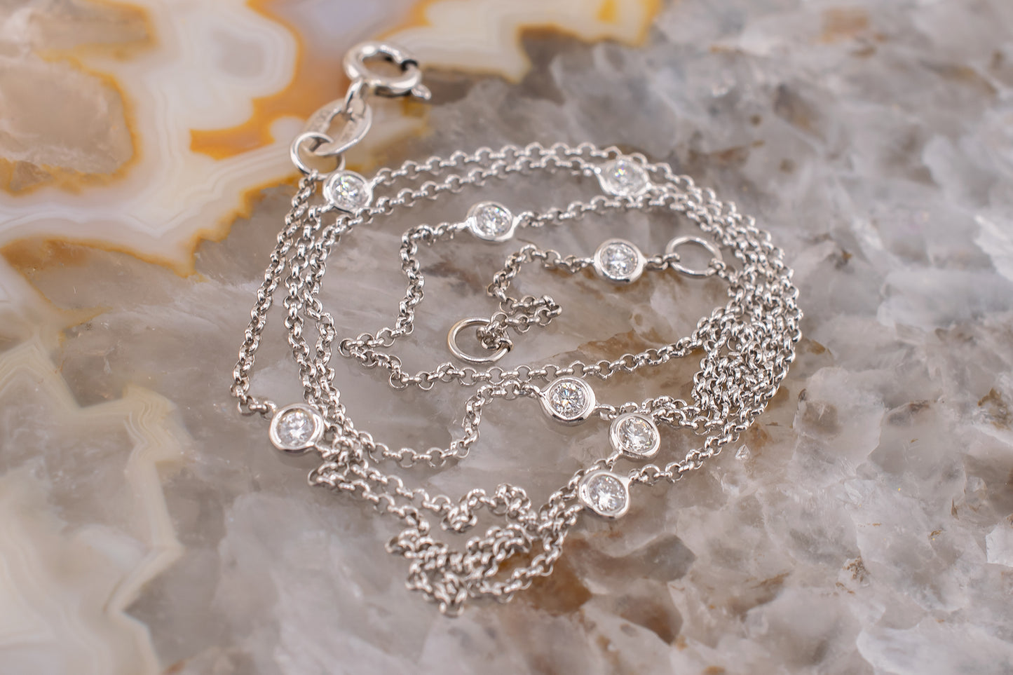 14 Karat White Gold Bezel Set Round Brilliant Cut 0.25 Carat Natural Diamond Station Necklace