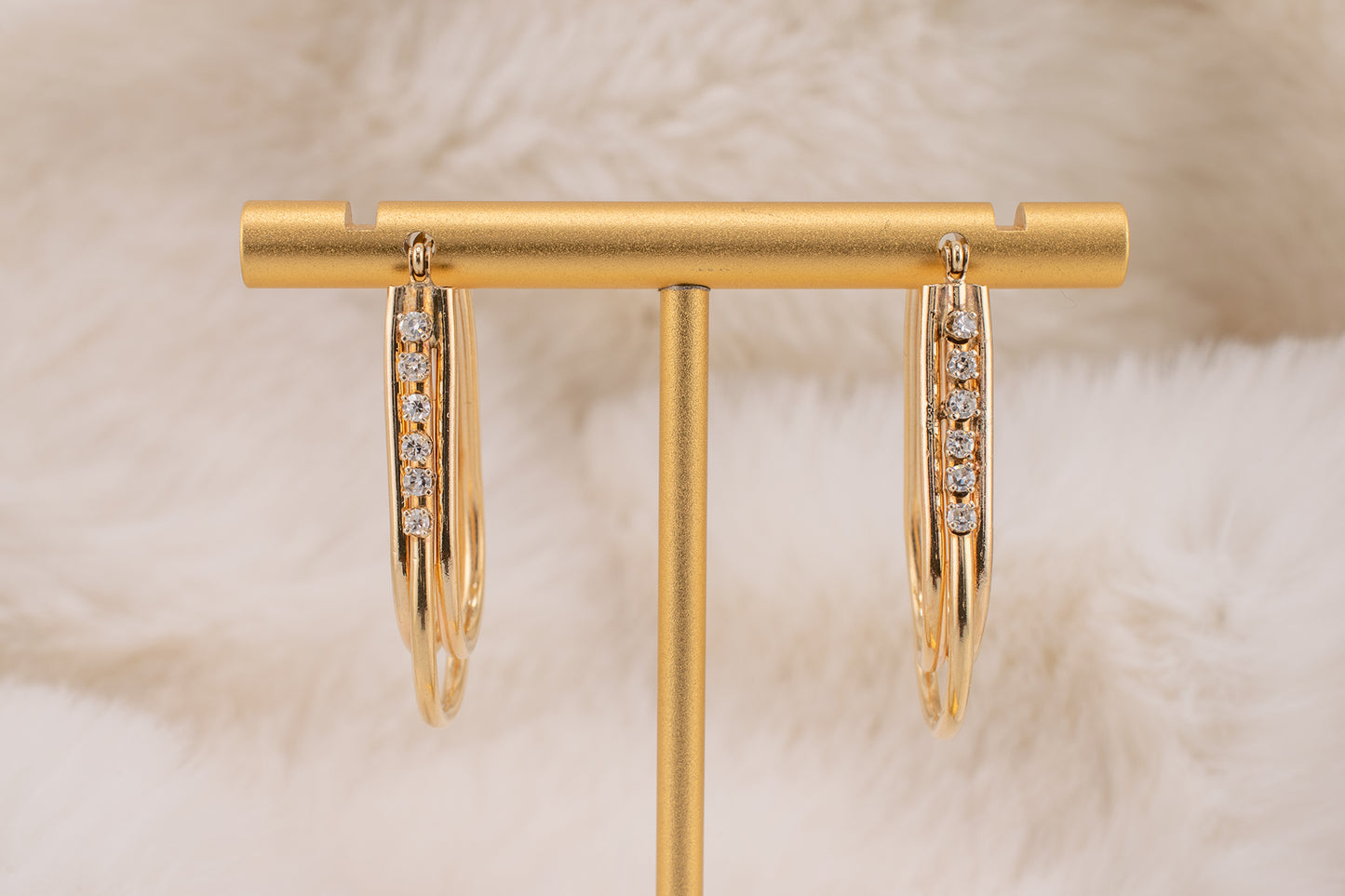 Circa 1980s Vintage 14 Karat Yellow Gold Prong Set 0.24 Carat Total Weight Natural Diamond Elongated Hoop Earrings 1.3 Inch Drop