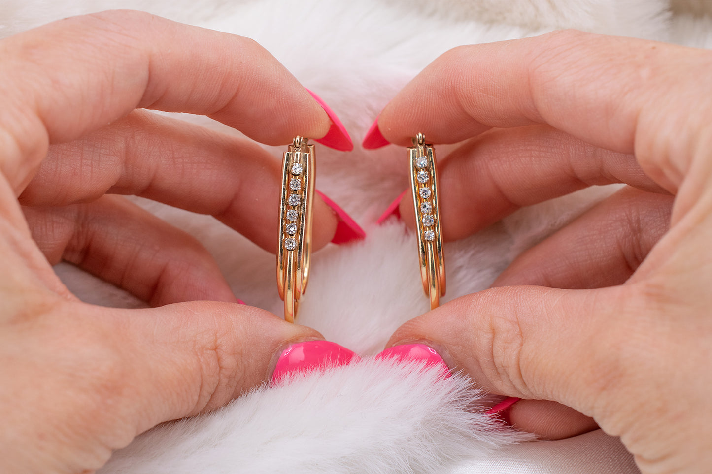 Circa 1980s Vintage 14 Karat Yellow Gold Prong Set 0.24 Carat Total Weight Natural Diamond Elongated Hoop Earrings 1.3 Inch Drop