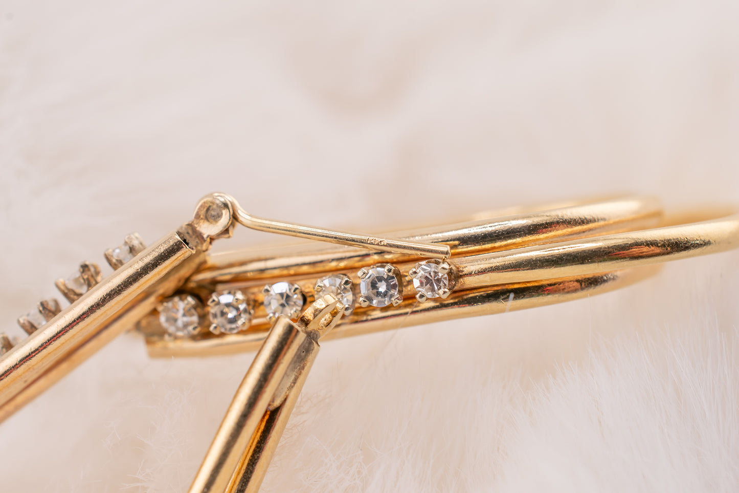 Circa 1980s Vintage 14 Karat Yellow Gold Prong Set 0.24 Carat Total Weight Natural Diamond Elongated Hoop Earrings 1.3 Inch Drop