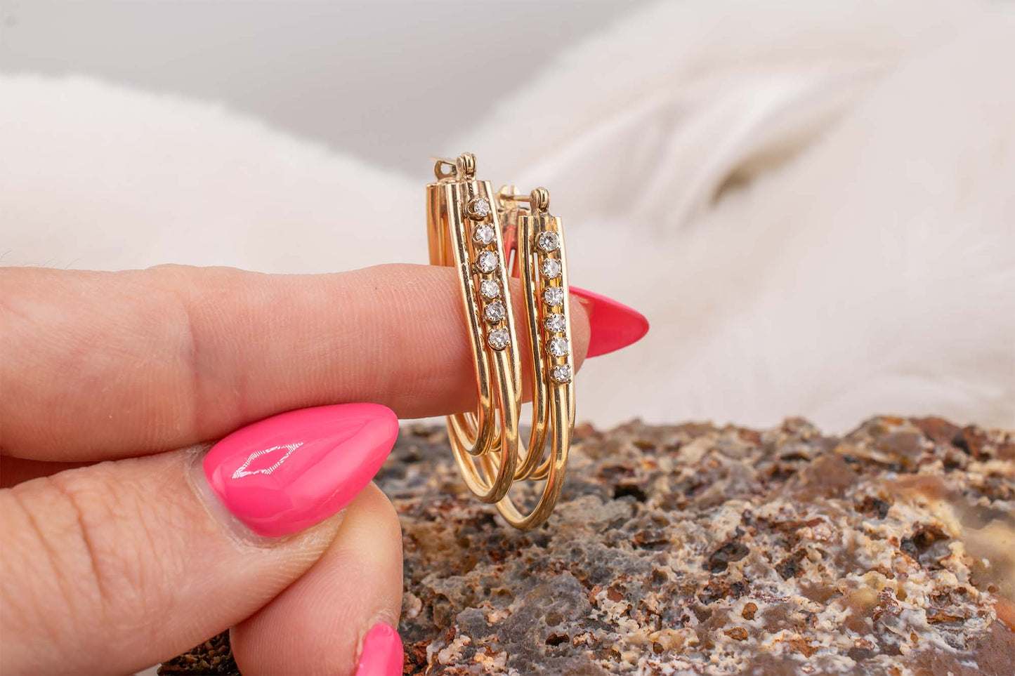 Circa 1980s Vintage 14 Karat Yellow Gold Prong Set 0.24 Carat Total Weight Natural Diamond Elongated Hoop Earrings 1.3 Inch Drop