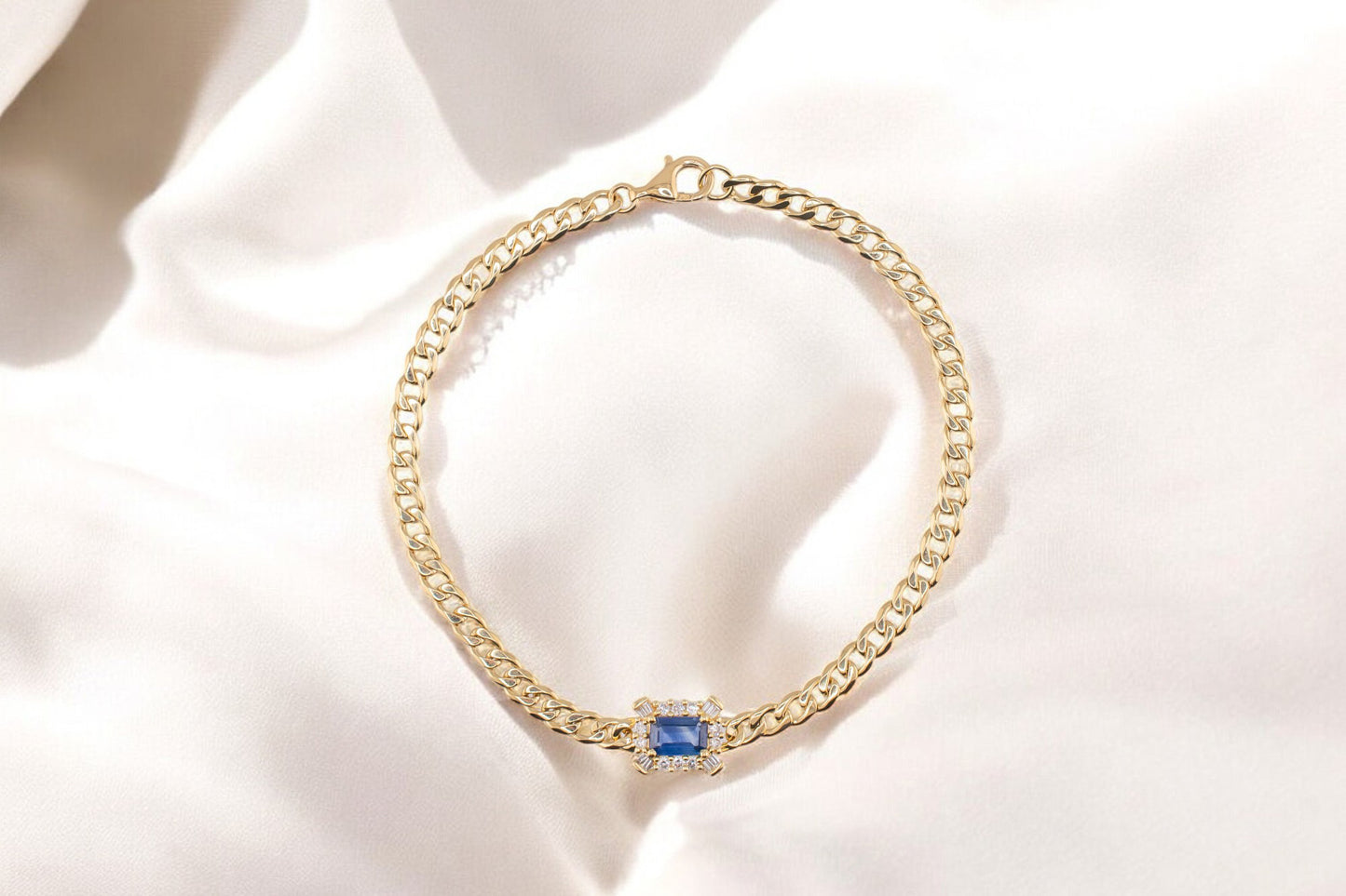 18 Karat Yellow Gold 0.40 Carat Emerald Cut Blue Sapphire & 0.15 CTW Diamond Bracelet