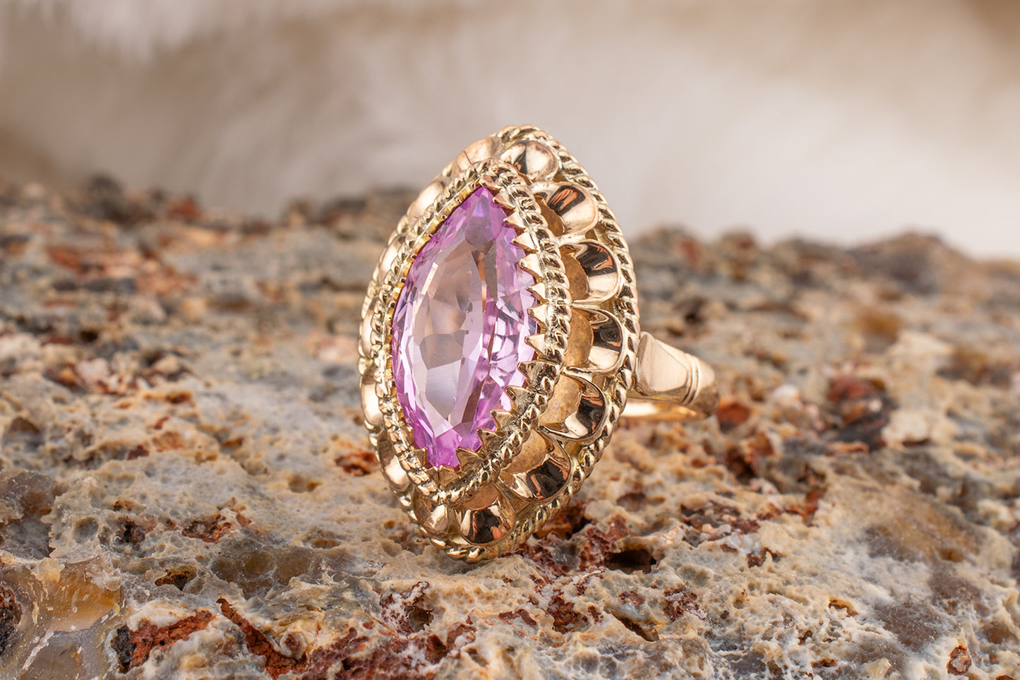 Circa 1950s-1960s Vintage 10 Karat Yellow Gold 3.73 Carat Marquise Shape Lab Grown Pink Sapphire Scalloped Cocktail Ring