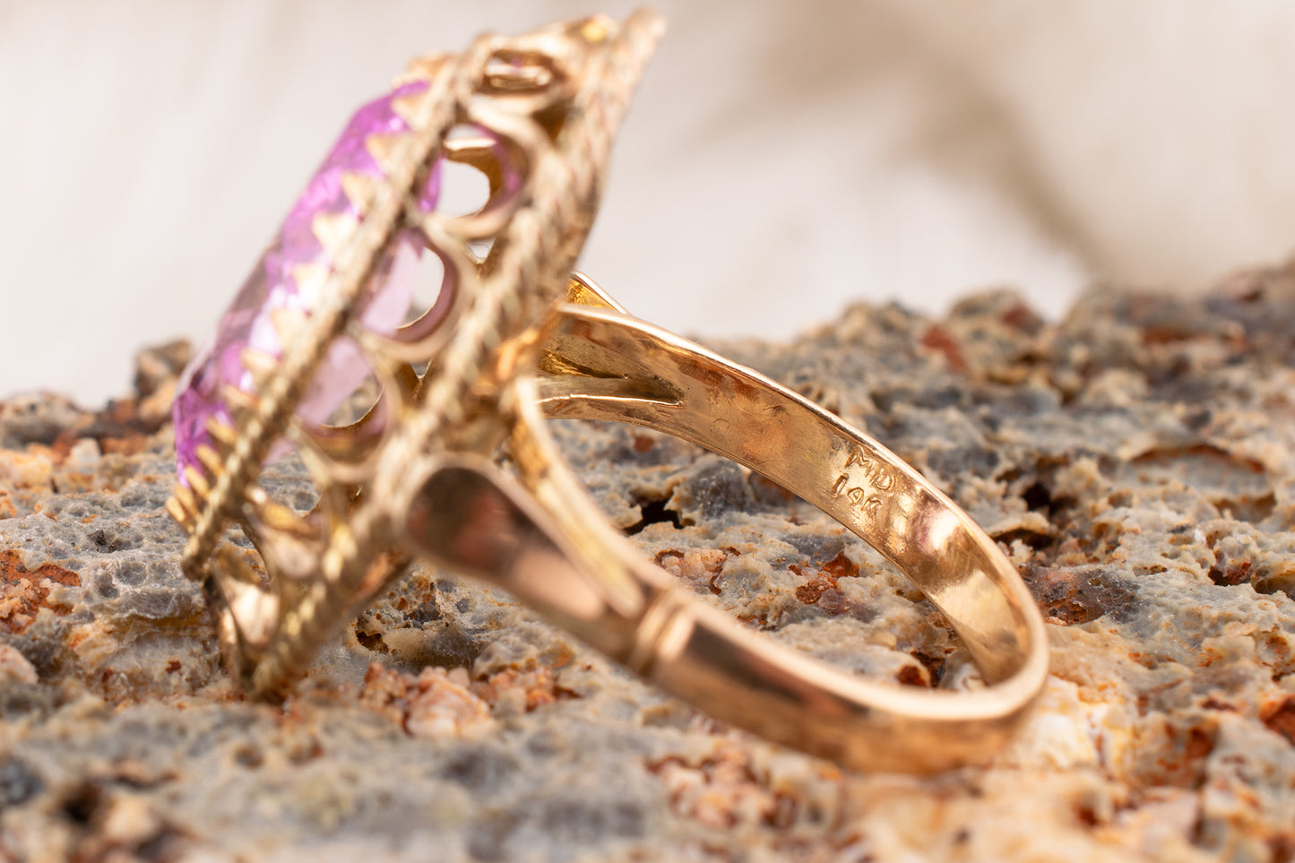 Circa 1950s-1960s Vintage 10 Karat Yellow Gold 3.73 Carat Marquise Shape Lab Grown Pink Sapphire Scalloped Cocktail Ring