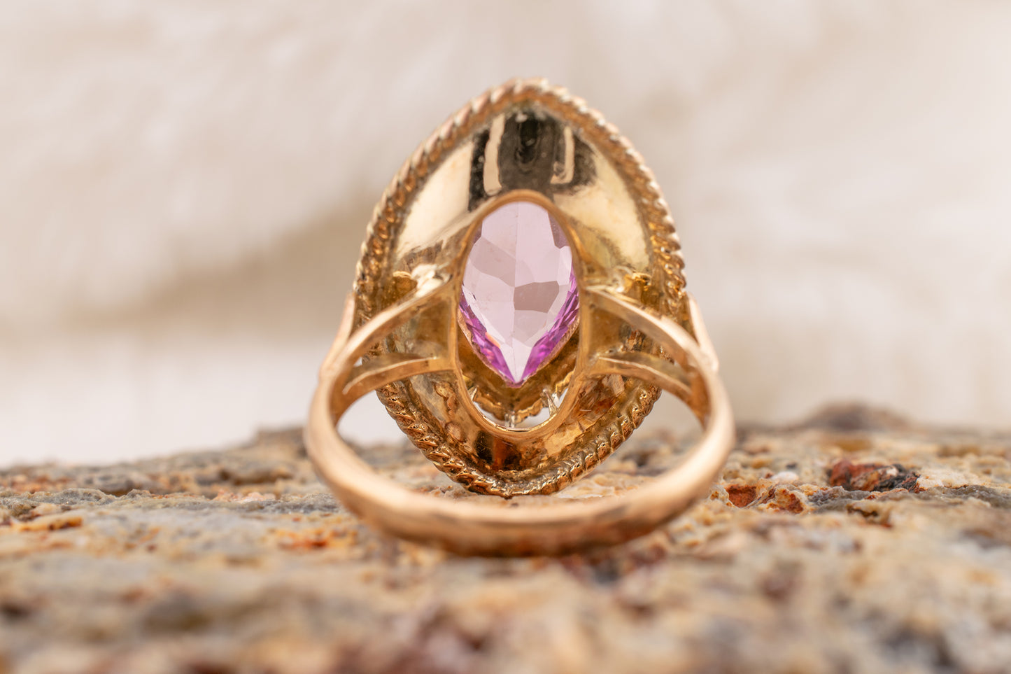 Circa 1950s-1960s Vintage 10 Karat Yellow Gold 3.73 Carat Marquise Shape Lab Grown Pink Sapphire Scalloped Cocktail Ring