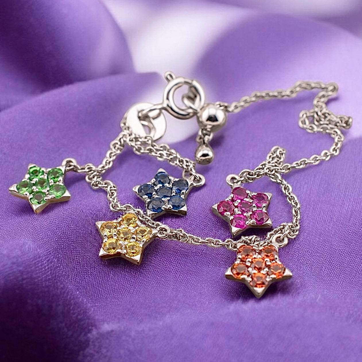 14 Karat White Gold Natural Multi Gemstone Blue Sapphire, Yellow Sapphire, Orange Sapphire, Ruby And Tsavorite Garnet Rainbow Star Bracelet