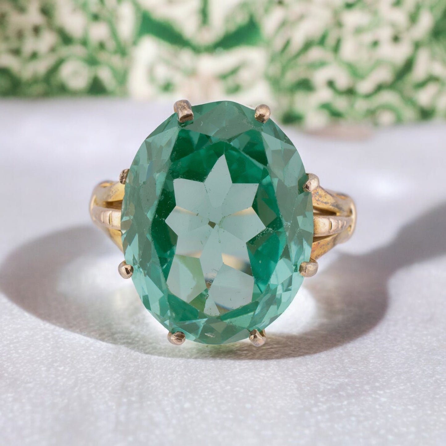 Circa 1940s Vintage 10 Karat Yellow Gold 18.58 Carat Uranium Green Synthetic Spinel Cocktail Ring