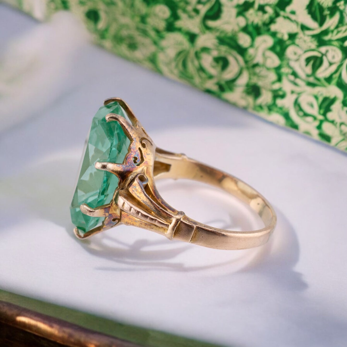 Circa 1940s Vintage 10 Karat Yellow Gold 18.58 Carat Uranium Green Synthetic Spinel Cocktail Ring