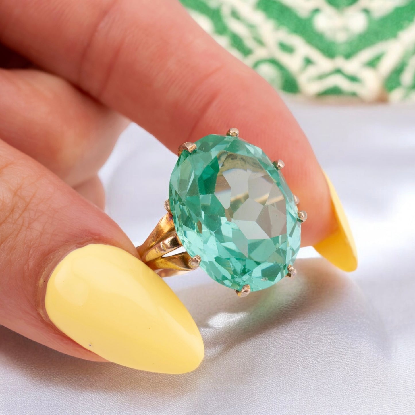 Circa 1940s Vintage 10 Karat Yellow Gold 18.58 Carat Uranium Green Synthetic Spinel Cocktail Ring