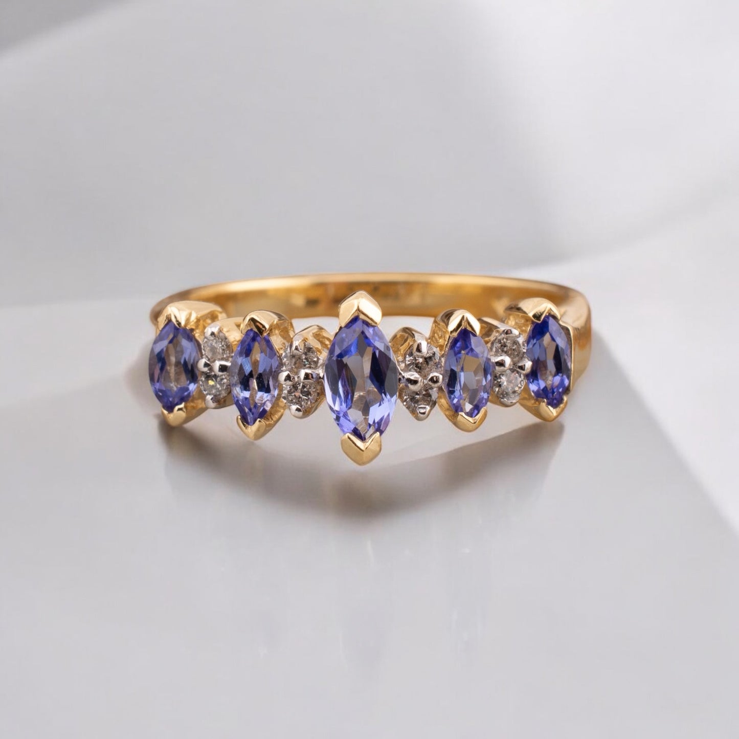 Petite Vintage 14 Karat Yellow Gold 0.50ctw. Marquise Shape Tanzanite & Diamond Ring Size 7.25
