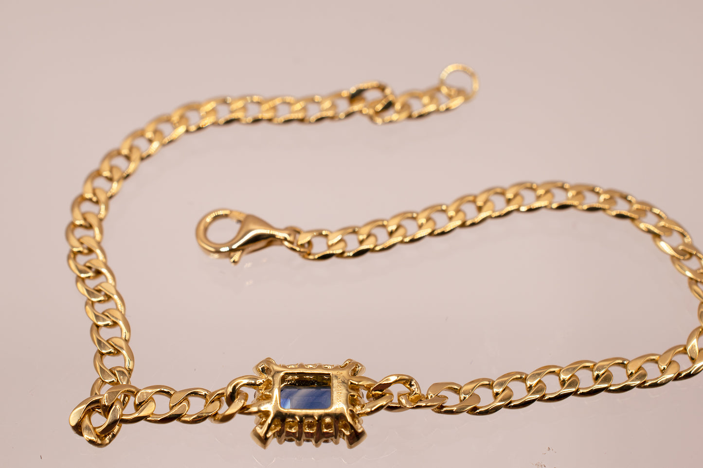 18 Karat Yellow Gold 0.40 Carat Emerald Cut Blue Sapphire & 0.15 CTW Diamond Bracelet