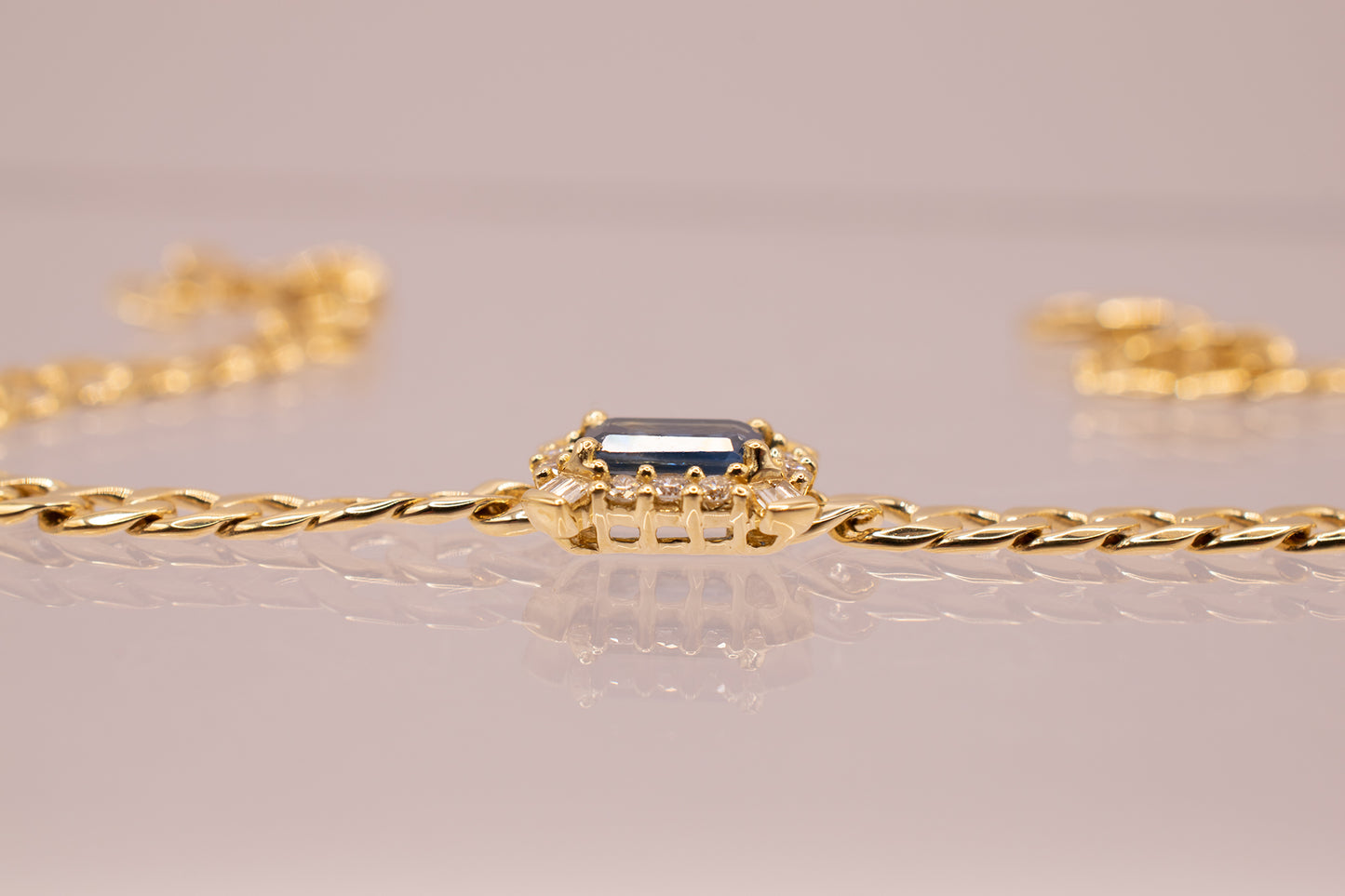 18 Karat Yellow Gold 0.40 Carat Emerald Cut Blue Sapphire & 0.15 CTW Diamond Bracelet