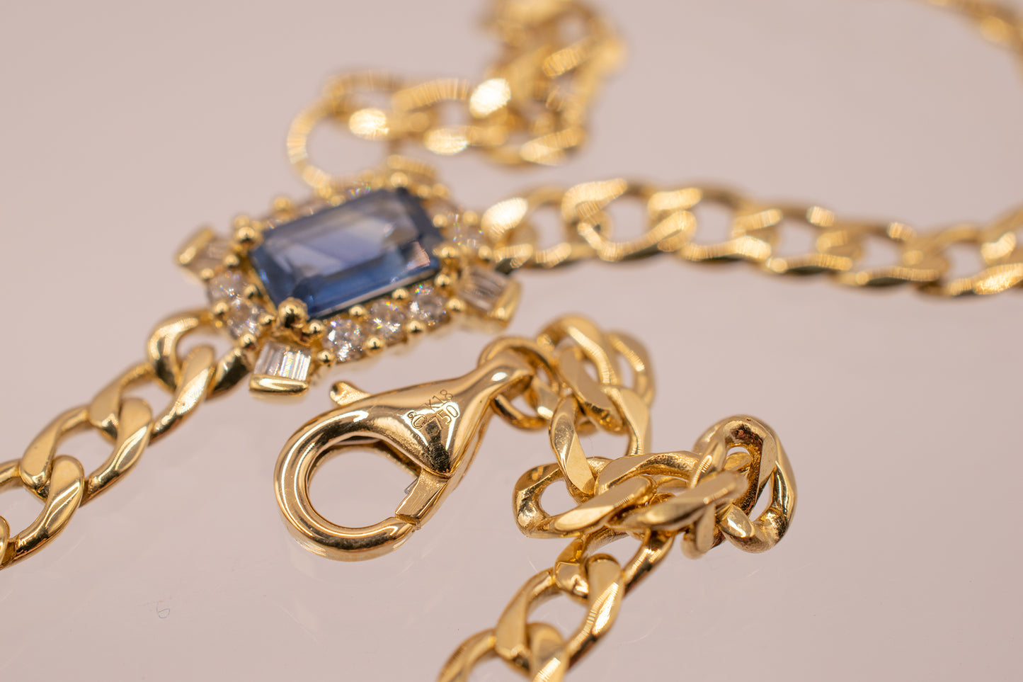 18 Karat Yellow Gold 0.40 Carat Emerald Cut Blue Sapphire & 0.15 CTW Diamond Bracelet