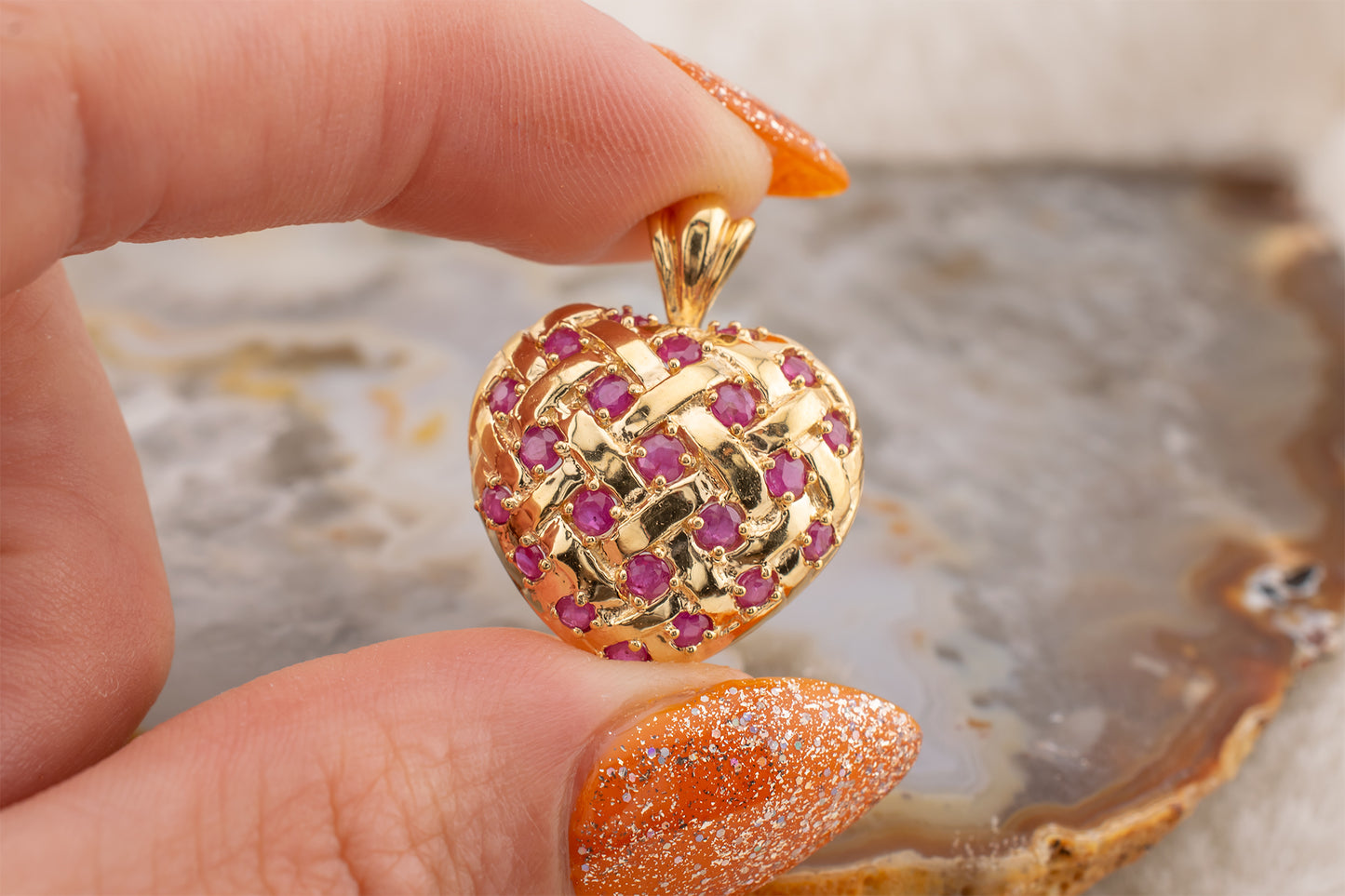 Circa 1990s Vintage 10 Karat Yellow Gold Lattice Design Quilted Heart Pendant Charm With Natural Rubies