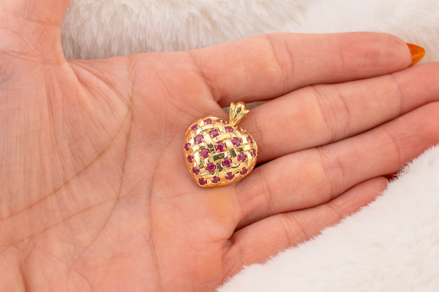 Circa 1990s Vintage 10 Karat Yellow Gold Lattice Design Quilted Heart Pendant Charm With Natural Rubies