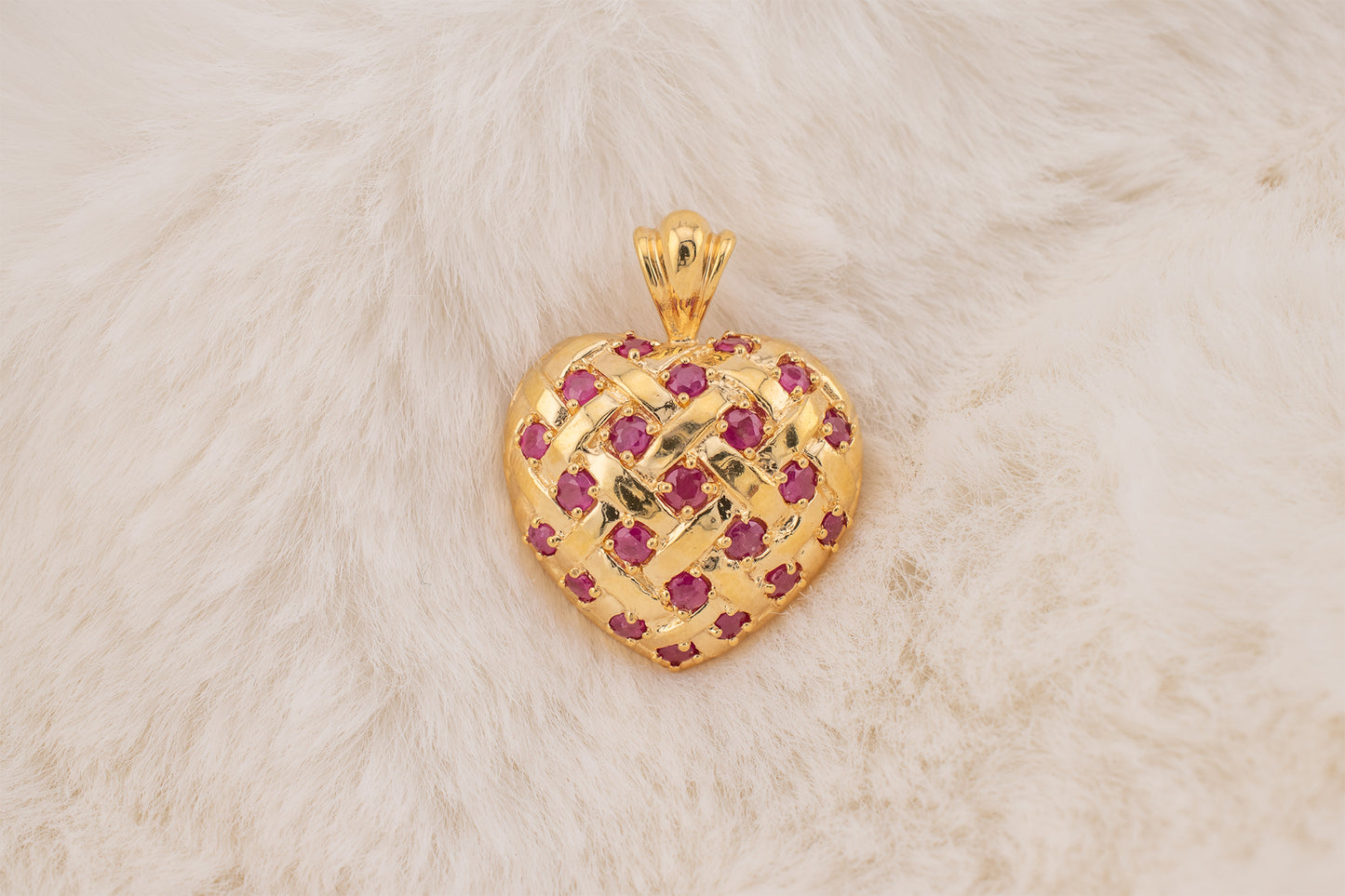 Circa 1990s Vintage 10 Karat Yellow Gold Lattice Design Quilted Heart Pendant Charm With Natural Rubies