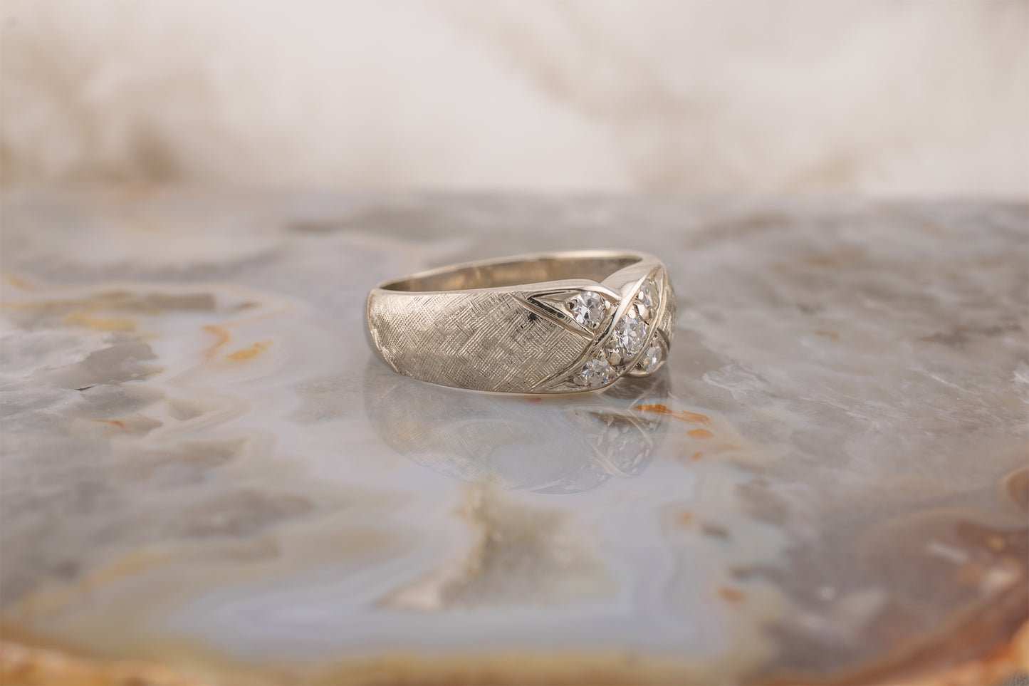 Circa 1970s Vintage 14 Karat White Gold 0.26 Carat Diamond X Ring with Florentine Finish Size 6 1/2