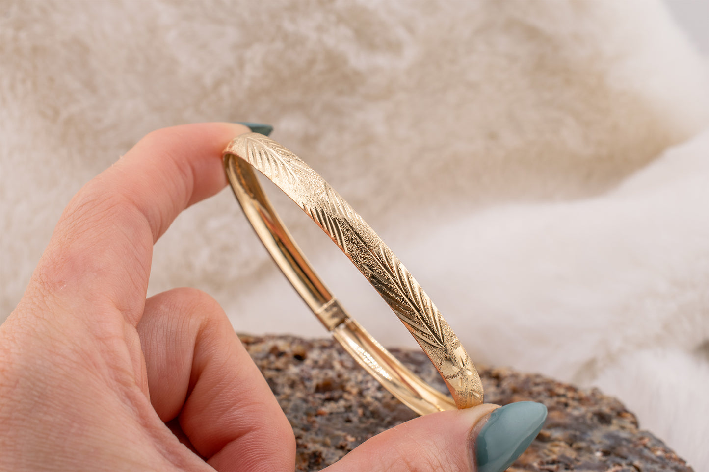 Circa 2000-2005 Vintage 10 Karat Yellow Gold Palm Leaf Design and Diamond Cut Detail Bangle Bracelet Approx. 7.75 Inches 6.2mm Wide