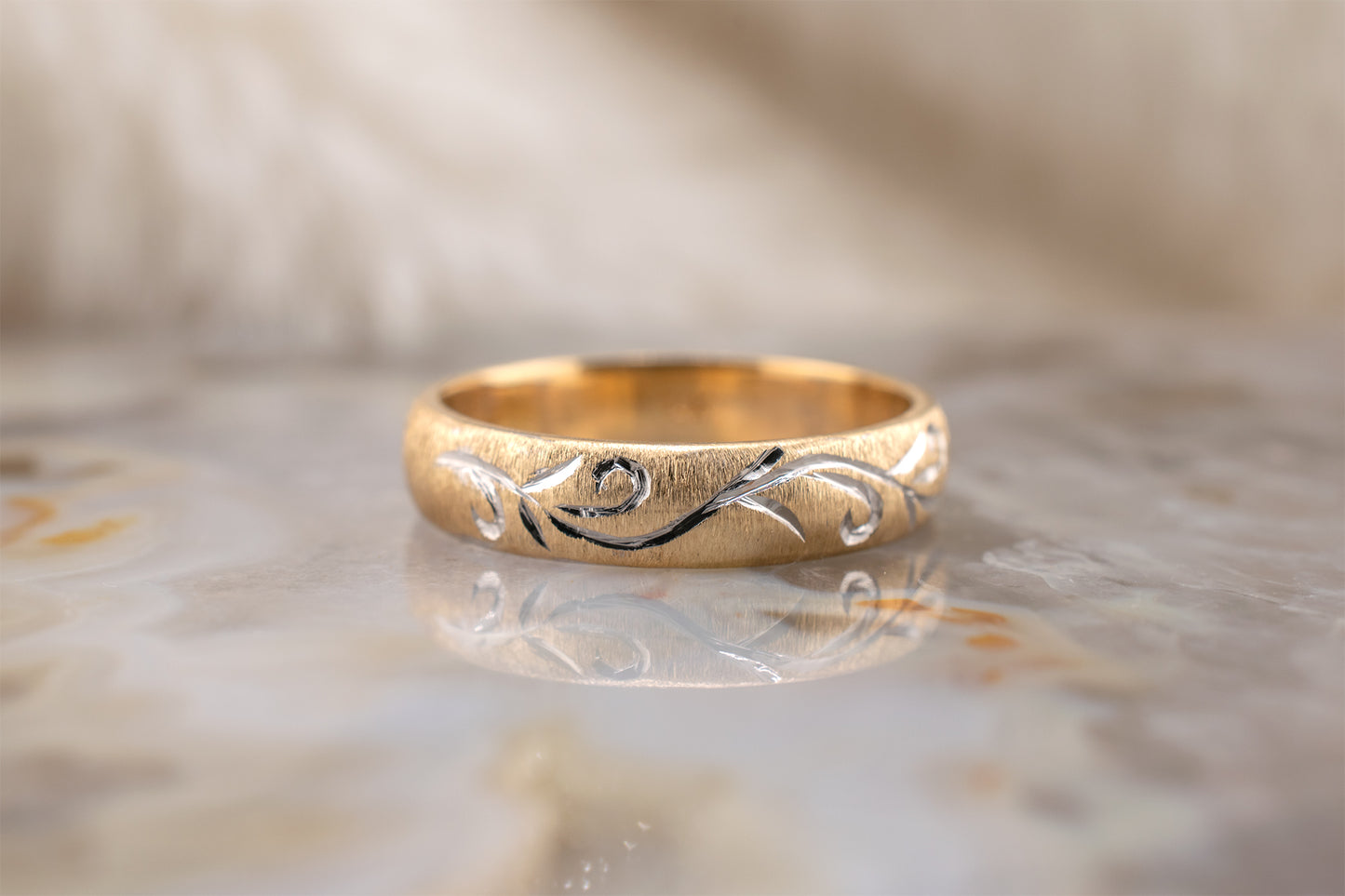 Circa 1990s Minimalist Vintage Two Tone Yellow Gold Satin Brushed Finish Band with White Gold Hand Carved Scroll Design Size 5.75 4.1mm