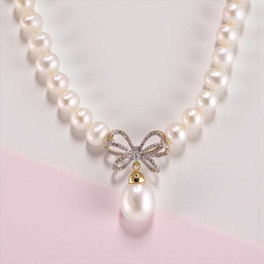 Vintage 10K Yellow Gold Diamond & Pearl Necklace with Bow Pendant
