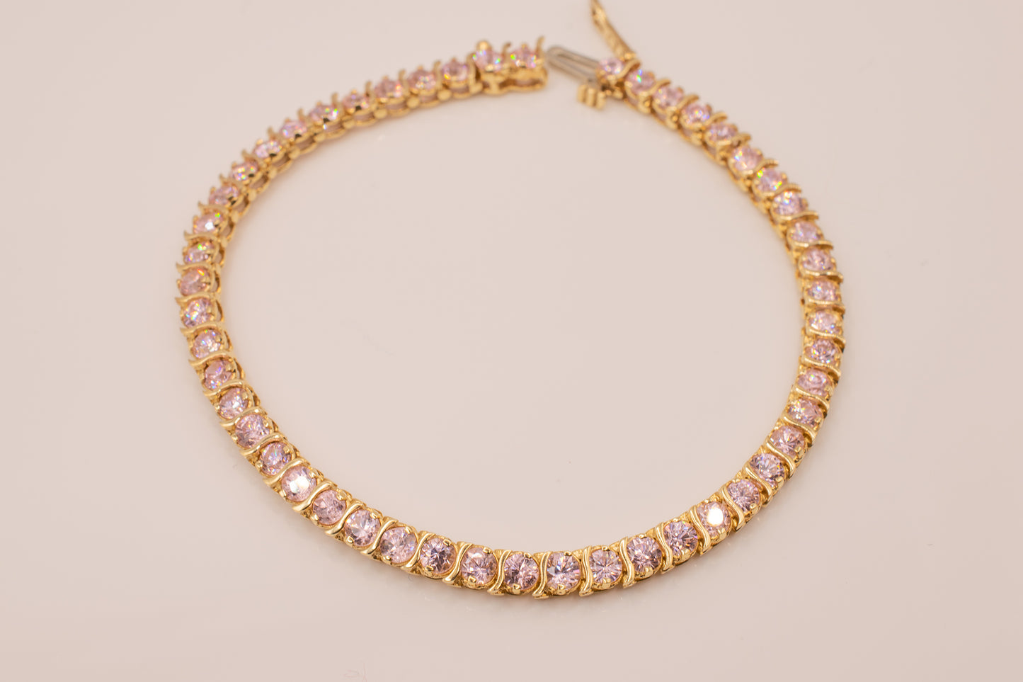 Vintage 14 Karat Yellow Gold Baby Pink 3mm Diamond Simulant Cubic Zirconia S-Design Tennis Line Bracelet 7 Inches Long